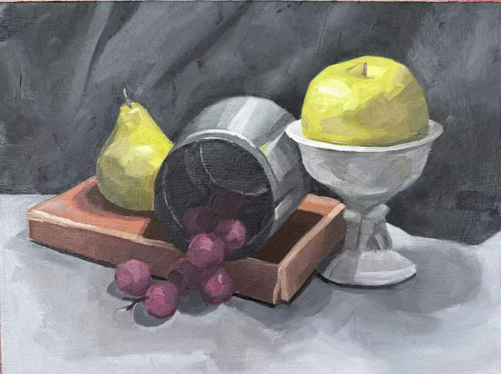 Oil painting of a still life: a yellow-green pear on a shallow wooden tray, a silver metal cup lying on its side with red grapes spilling out in front, and a large green apple resting in a white footed bowl, all on a pale grey cloth before a dark grey draped background.